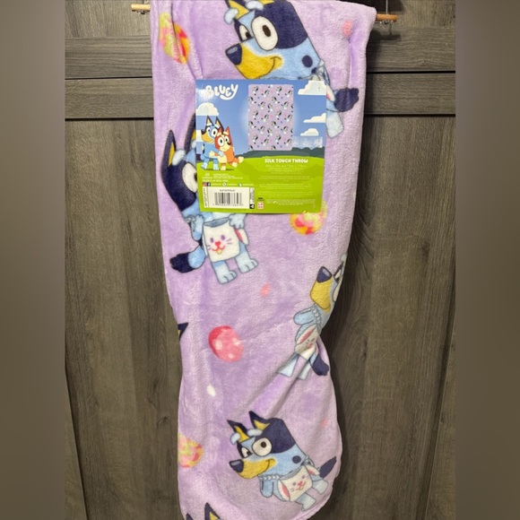 New Bluey Heeler Easter 50" x 70" Purple Soft Plush Throw Blanket On Hanger - Picture 1 of 8